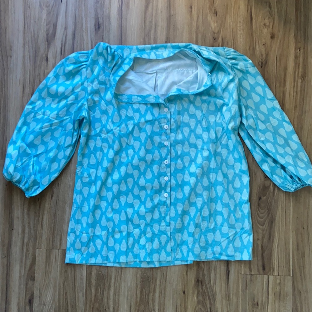 Blue boho loose fitting top.